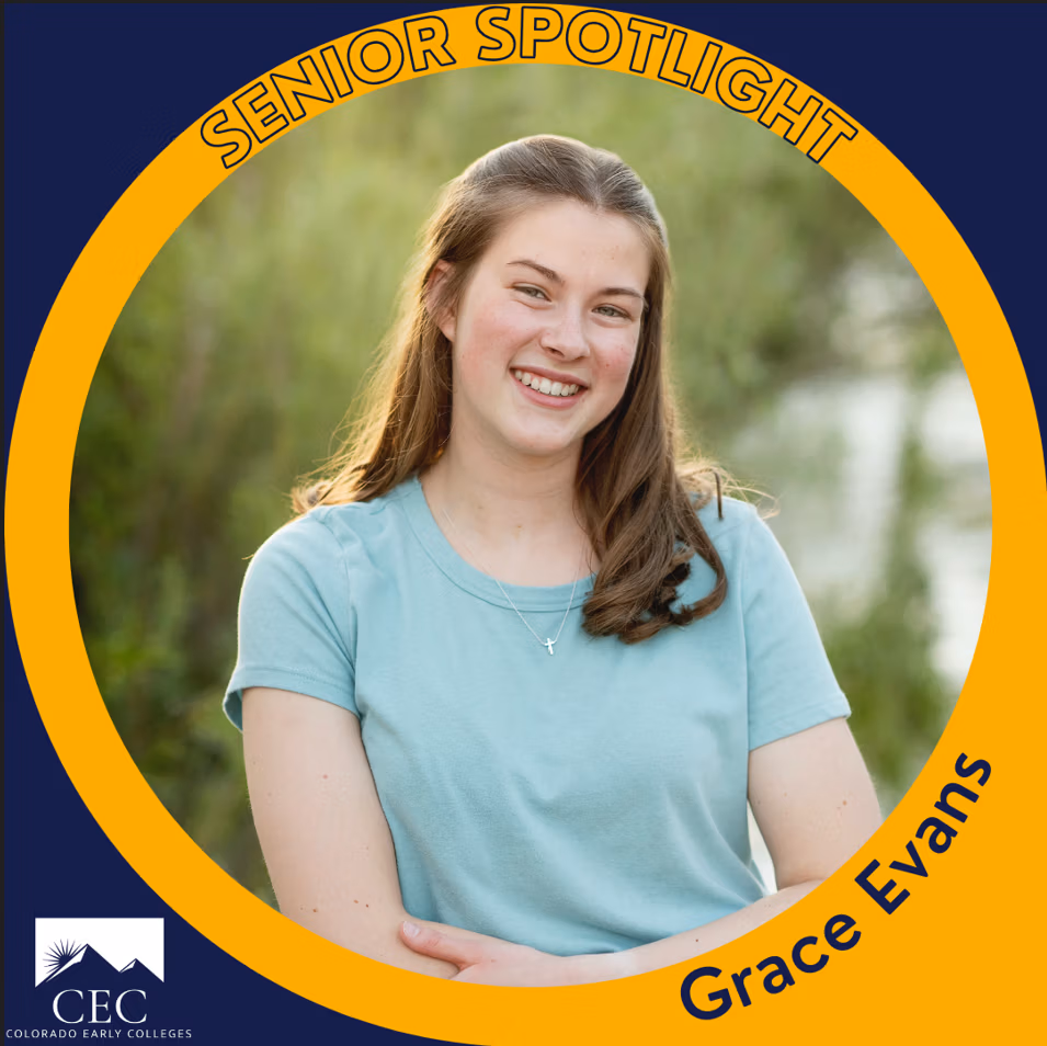 Student Spotlight: Grace Evans. Grace smiles in front of a green forested background.