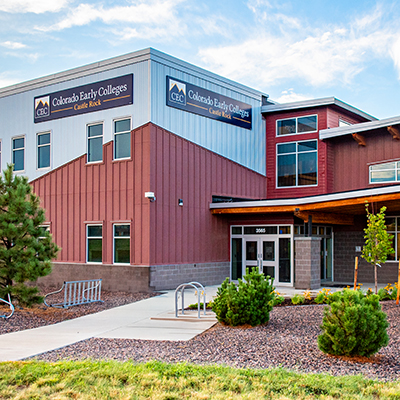 Colorado Early Colleges Castle Rock high school building with red and grey exterior.