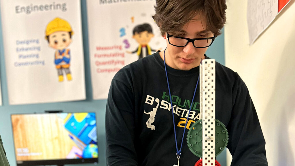 CEC Colorado Springs Student works on a robotics project.