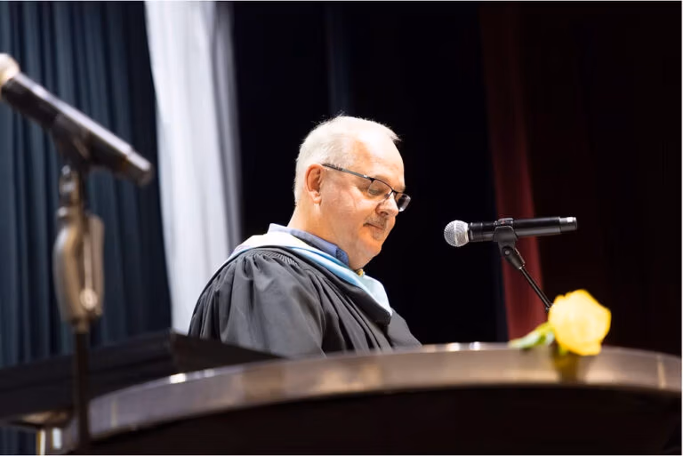 CEC Fort Collins head of school Gordon Boschman gives a speech during the 2025 graduation ceremony.