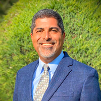 Headshot of Frutoso Chavez Head of School at CECDCN.