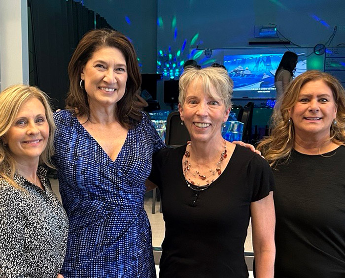 CEC Castle Rock faculty pose for a picture during the high school dance.