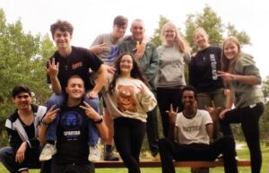CEC Douglas County North students posing for a picture on a picnic table.