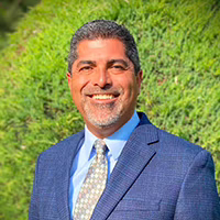 Headshot of Frutoso Chavez Head of School at CECDCN.